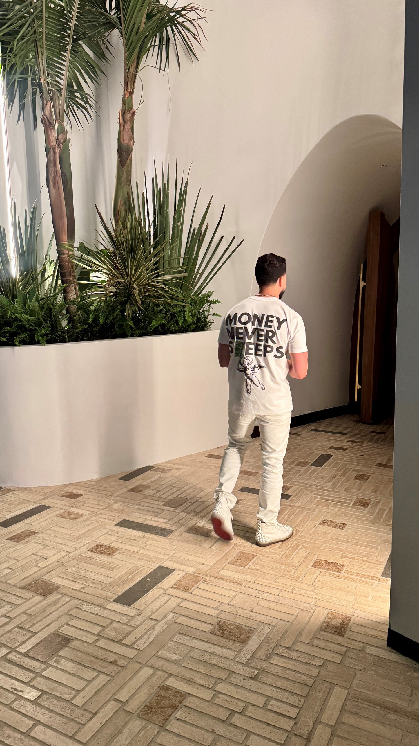 White T-Shirt: Money Never Sleeps